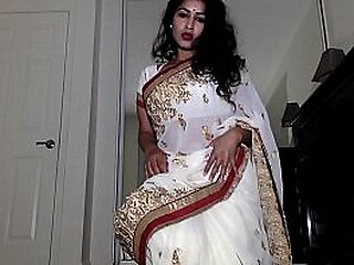 Desolate Aunty Wearing Indian Costume near Tika Statute apart from Statute Getting Unfurnished Shows Vagina